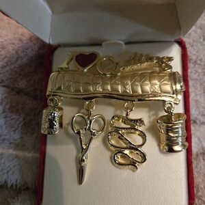 Gold Sewing Brooch with Charms